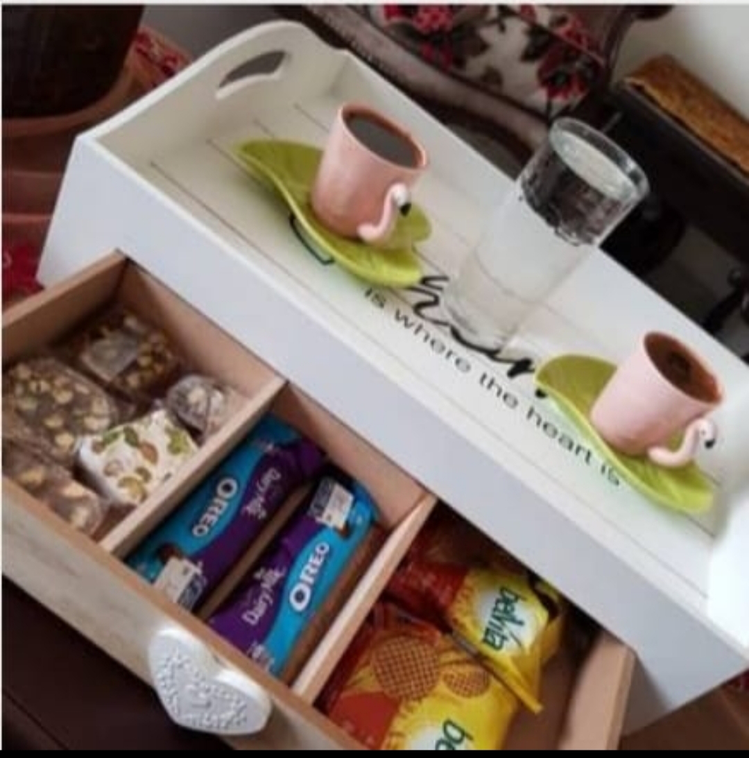 A tray with divided wooden drawer